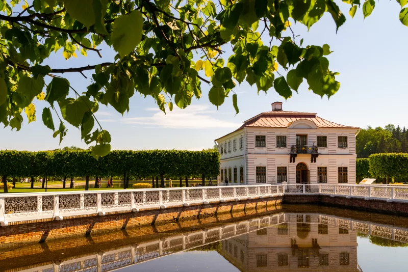 Palace and park with water reflection