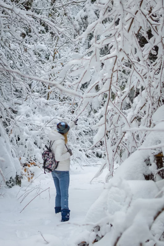 Girl in a snowy forest