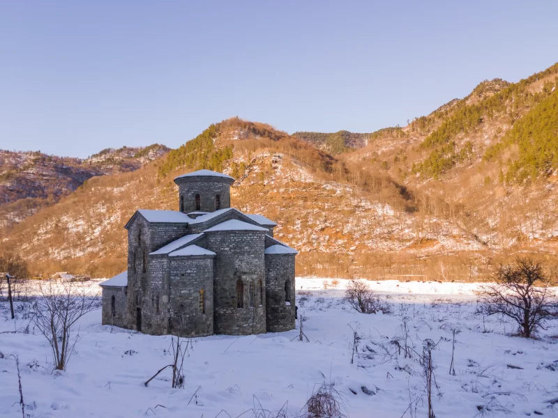Ancient temple in snow-covered mountains