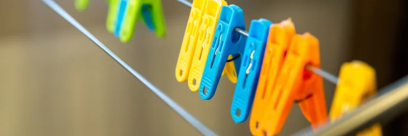 Close-up of colorful laundry pins and for hanged clothes drying