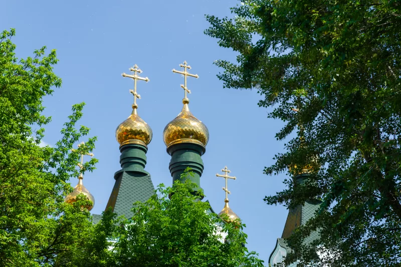 Eastern orthodox crosses on gold domes or cupolas