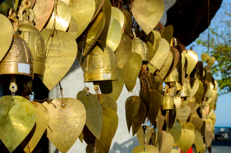 Wish bells and hearts in Buddha temple