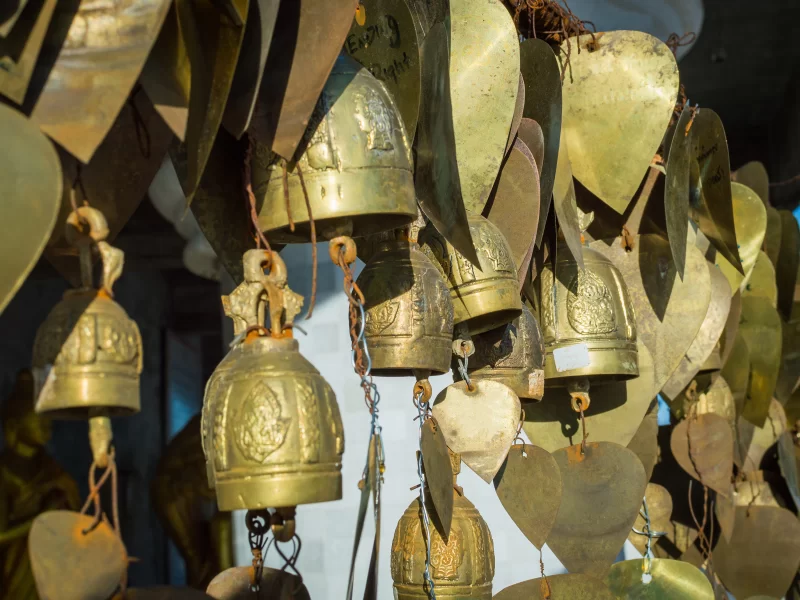 Wish bells and hearts in Buddha temple