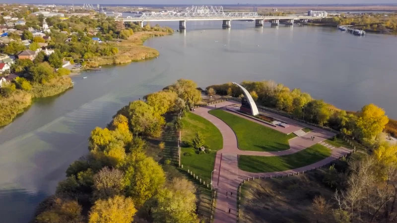 Forest or Grove on cape between two rivers. Aerial view