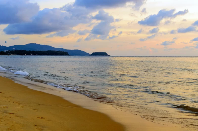 Golden sunrise sunset over the sea ocean waves