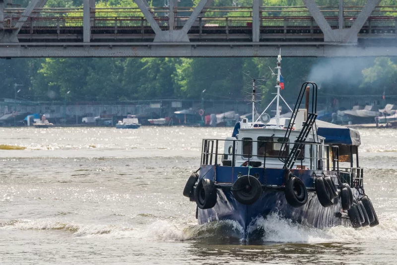 The tugboat sails along the Don River