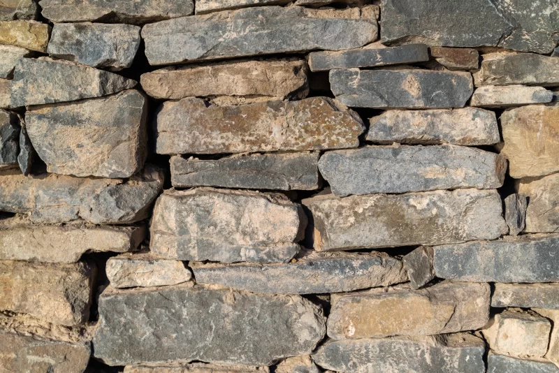 Cracked real stone wall